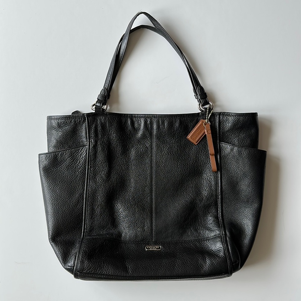 Used but in good condition black Coach F28726 Park North South Leather Tote,
